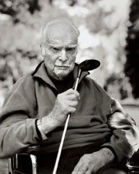 Mike Austin holds a fairway wood